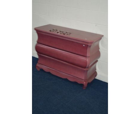 A MODERN DUSKY PINK BOMBE THREE DRAWER COMMODE, with silvered Rococco style handles (detached), width 120cm x depth 51cm x he