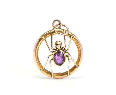 A GEM SET SPIDER PENDANT, of circular outline with central openwork spider detail, the spider with an oval amethyst body and 