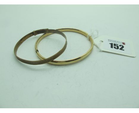 A Modern 9ct Gold Bangle, of plain design, together with a Rolled Gold expanding bangle. (2) 