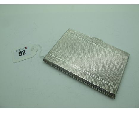 A Hallmarked Silver Cigarette Case, HFW, Birmingham 1945, of rectangular form allover engine turned, gilt lined, 200grams. 