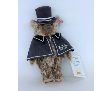 STEIFF TEDDYBÄR "KaDeWe Portier"Jubiläumsbär 100 Jahre KaDeWe. Limitierte Auflage: 677/1000. L.24cm. Originalkarton und Zerti