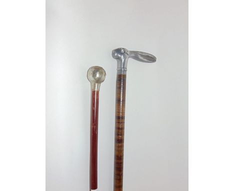 Interesting striped exotic hardwood walking stick,  with cast pewter rabbit head and knop; together with a further swagger st