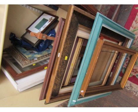 A quantity of miscellaneous frames including moulded gilt examples, painted examples, etc, together with an adjustable table 