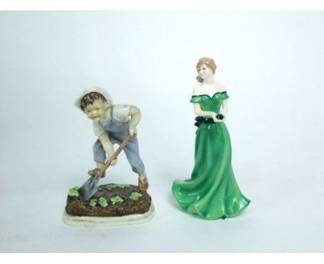 A Royal Worcester figure - Saturdays Child, in the form of a little boy digging in a garden together with a Royal Worcester b