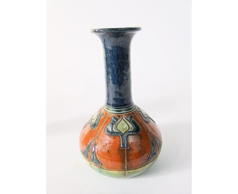 An early 20th century art pottery vase with globular body and drawn neck with incised and painted art nouveau style organic m