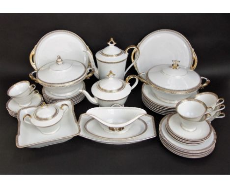 A quantity of Bavarian K & A Krautheim dinner and tea wares with black and gilt border decoration comprising a pair of two ha