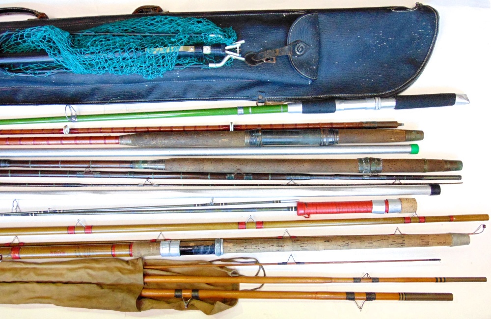 A collection of vintage fishing rods including rods by Martin James