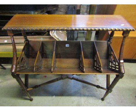 A Regency style mahogany five divisional book stand on turned supports and rails with raised shelf, 90cm