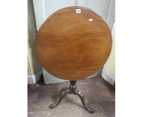 A good quality Georgian mahogany snap top occasional table, 65cm one piece top raised on a turned and wrythen fluted column a