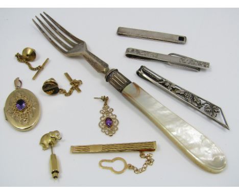 A diamond lapel pin marked 750, modelled as a baby elephant, together with a 9ct amethyst set locket, four tie pins - three s