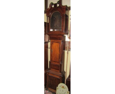 A late Georgian oak country made longcase clock with walnut cross banding, reeded column supports, the hood with swan neck co