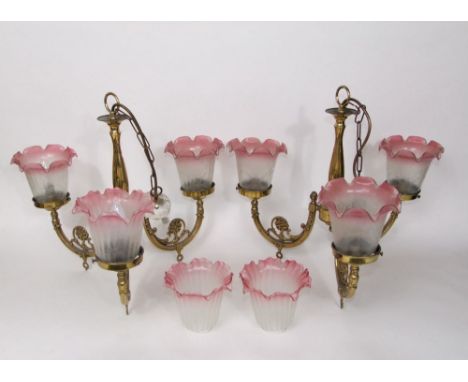 Pair of three branched ceiling lights with Harlequin etched glass light shades, with opaque and pink fade, decorated with typ