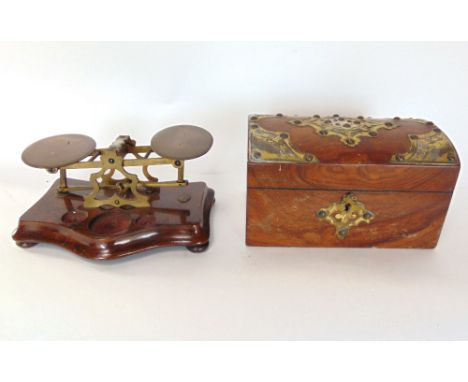 19th century walnut and brass strap work tea caddy; together with a set of 19th century postal scales by S Mordan &amp; Co of