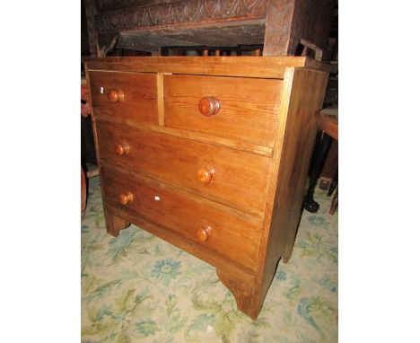 A small stripped pine bedroom chest of two long and two short drawers with  bracket shaped supports (3ft wide approx)