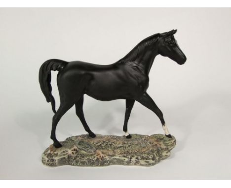 A Beswick matt glazed model of a walking horse - Moonlight, in black colourway with printed mark to base