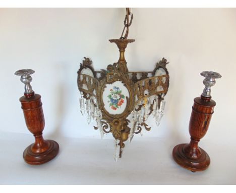 French cast metal ceiling light with curved triform top fitted with a painted opaque glass panel; with prismatic drops and sc