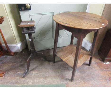 An 18th century oak tripod table base with turned column supports and bird cage action, together with a Georgian oak occasion