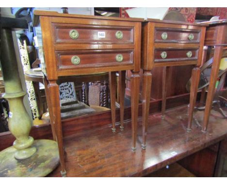 A pair of good quality mahogany bedside chests/lamp tables of rectangular form each with tray top and fitted with two frieze 