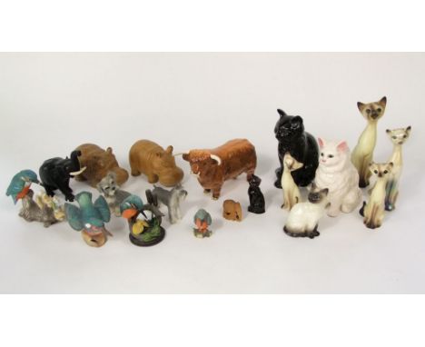 A Beswick model of a Highland bull, together with further ceramic animals including a Beswick model of a Siamese cat with imp