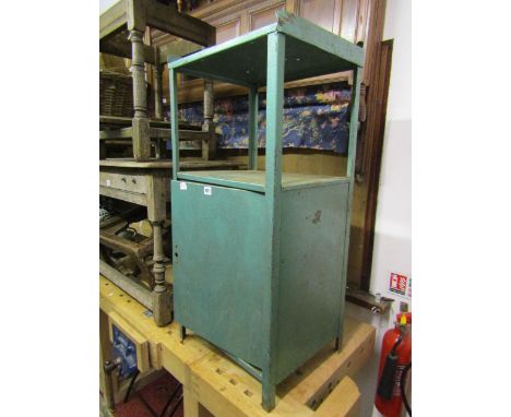 A vintage iron work table of square cut form, the lower section enclosed by a cupboard door, 48cm wide