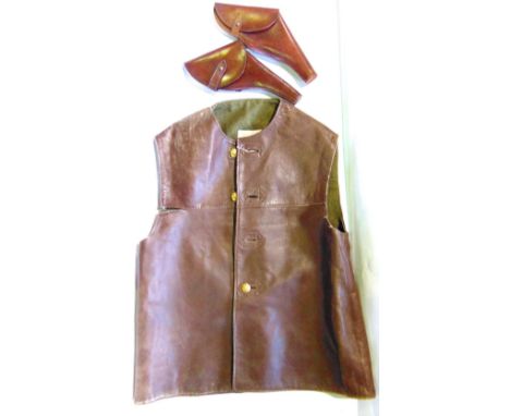 Leather waistcoat with two leather gun holsters, a military issue army bag and copper warming pan (4)