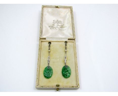 A boxed pair of jade drop earrings, each set with a pearl, in 9ct white gold