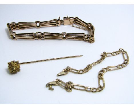 A 9ct gate link bracelet together with a further 9ct bracelet (af) and a yellow metal stick pin with canetille decoration, 13