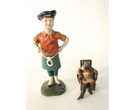 A Royal Doulton figure - The Foaming Quart HN2162, together with a pottery figure of a standing Scotsman in kilt and Tam O'Sh