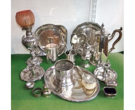 A mixed collection of silver plated items to include a silver plated oil lamp, the bowl embossed with foliage and wrythen flu