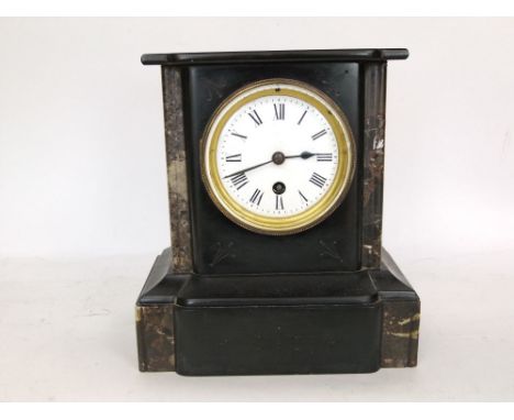 19th century black slate mantle clock with single train enamelled dial, fitted with Roman numerals, 24cm high