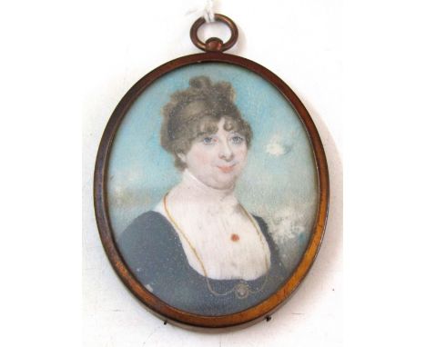 A 19th century portrait miniature of oval form showing lady wearing a gilt chain necklace, 6cm approx max size in oval brass 