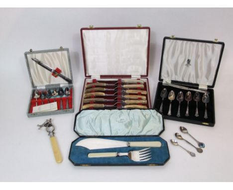 Boxed cutlery set to include a horn handled knife and fork set, various spoons, together with two timber sheep tags