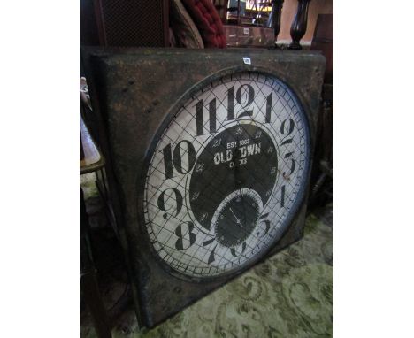 A large contemporary industrial style metal encased wall clock with circular painted dial with battery movement