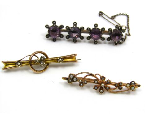 Two 9ct gold seed pearl bar brooches, 4g. Together with a further brooch set with amethysts.