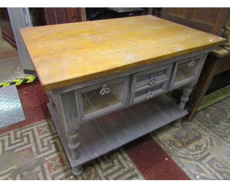 A vintage style central aisle shop/kitchen counter with pine top and painted lower section, each side fitted with an arrangem