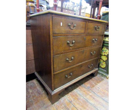A Georgian oak Countrymade chest of three long and two short drawers on bracket suuports, 93cm wide