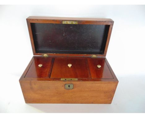 19th century mahogany three divisional tea caddy, the hinged lid enclosing three lidded compartments with key, 30 cm long