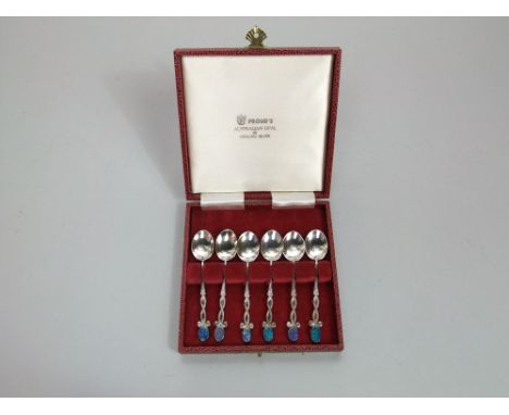 A cased set of six Australian sterling silver coffee spoons with opal settings