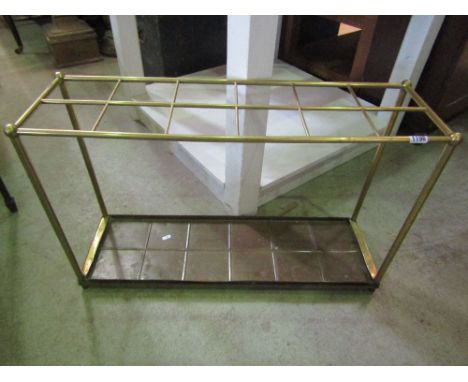 A brass twelve divisional stick stand with copper drip tray, 80cm wide