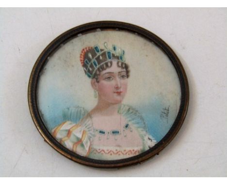 A portrait miniature of circular form, believed to represent Empress Eugenie of France, with signature to right Petit, 6cm di