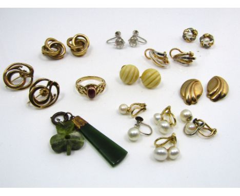 A 9ct ruby ring of Celtic design, together with a 9ct mounted pendant, possibly jade and a quantity of gold earrings, mostly 