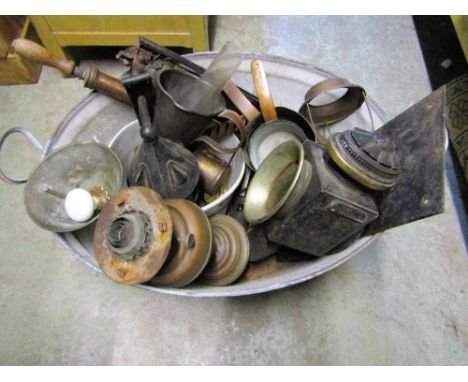 Galvanized iron bath containing brass oil lamps, lantern, brass garden sprayer, blow lamps, oil lamp burners, copper pans etc