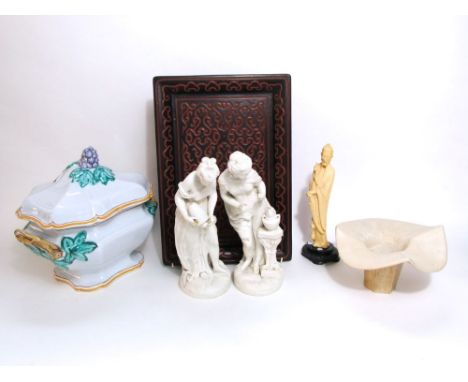 A pair of 19th century Parian allegorical figures of females in classical drapery, one warming her hands on a flame the other
