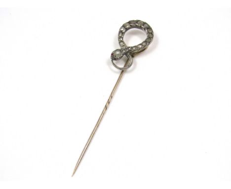 A Georgian 9ct old cut diamond stick pin in the form of a coiled snake, head set with a natural pearl and ruby eyes