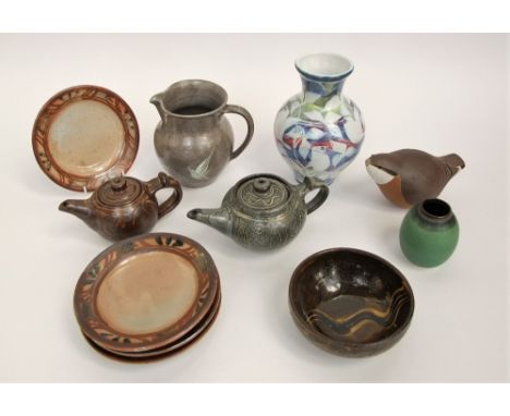 An interesting collection of studio pottery wares including four Wenford Bridge Pottery dishes by Seth Cardew with lustred bo