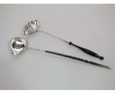 Silver toddy ladle with whale bone handle with Queen Anna coin base and a further ladle marked Christofle