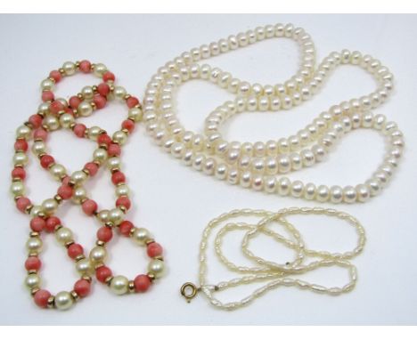 Two cultured pearl necklaces, one interspersed with coral and yellow metal beads and a further seed pearl necklace