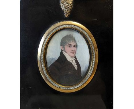 Frederick Buck (1771-1839) Portrait miniature of a gentleman in black coat, white chemise, stock and concertinaed cravatwater