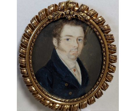 French School, 1821 Portrait miniature of a gentleman wearing a blue coat, white waistcoat and an earringsigned indistinctly 