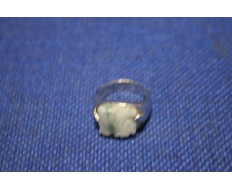 A SILVER AND JADE SIGNET RING